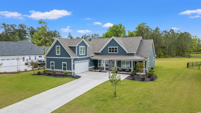 804 Edisto Ct, Myrtle Beach, SC 29588 - craftsman-style house with board and batten siding, covered porch, driveway, and a front lawn