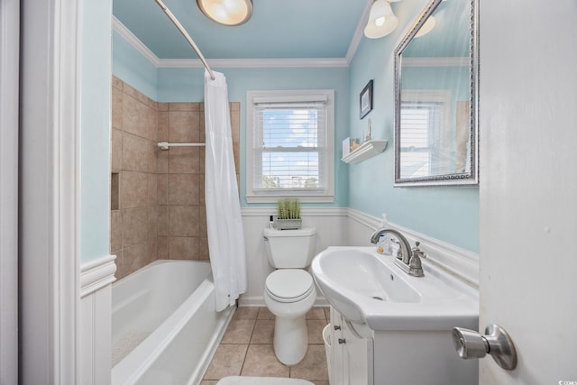 bathroom with toilet, shower / bath combo with shower curtain, crown molding, tile patterned flooring, and vanity