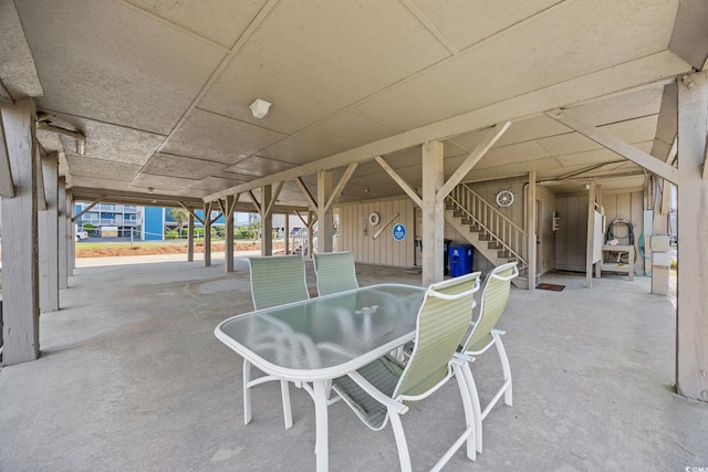 view of patio / terrace with stairway and outdoor dining area
