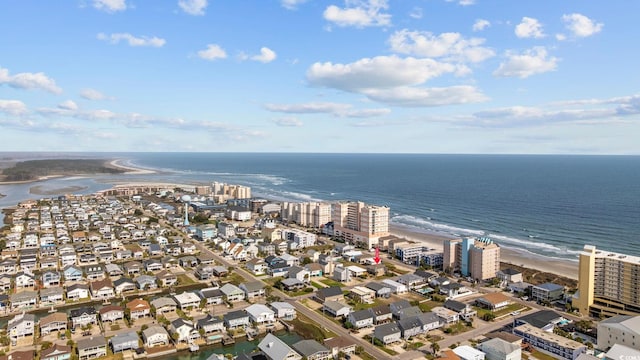 aerial view featuring a water view and a view of the beach