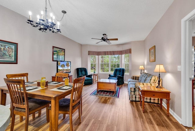4608 Arran Ct Unit E, Myrtle Beach, SC 29579 - dining space featuring light wood-style floors, a chandelier, a ceiling fan, and baseboards