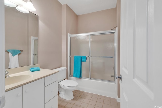 4608 Arran Ct Unit E, Myrtle Beach, SC 29579 - full bathroom with vanity, toilet, tile patterned floors, and shower / bath combination with glass door