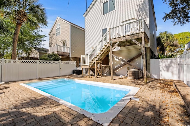 213-A 16th Ave S, Surfside Beach, SC 29575 - view of swimming pool with stairs, a fenced backyard, a fenced in pool, and a patio
