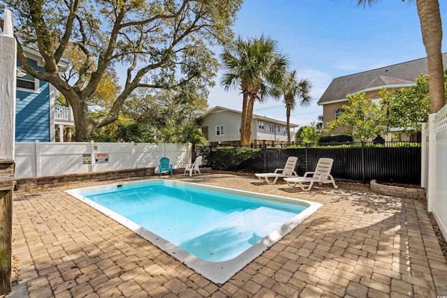 213-A 16th Ave S, Surfside Beach, SC 29575 - view of pool with a patio, a fenced in pool, and a fenced backyard