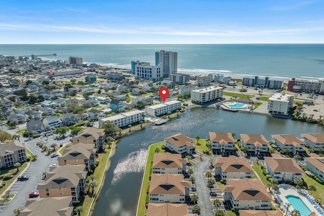 drone / aerial view featuring a water view