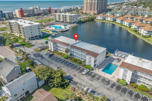 drone / aerial view with a water view and a view of city