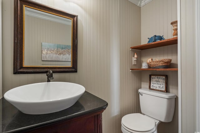 bathroom with toilet and vanity