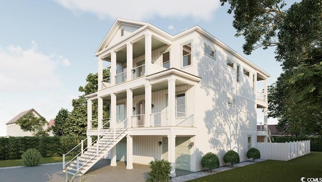 914 Perrin Dr, North Myrtle Beach, SC 29582 - view of front of home with a balcony, a porch, and stairs