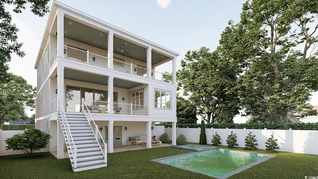 914 Perrin Dr, North Myrtle Beach, SC 29582 - rear view of house featuring a balcony, a patio area, and stairway