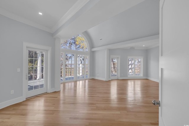 unfurnished living room with recessed lighting, visible vents, light wood-type flooring, and baseboards
