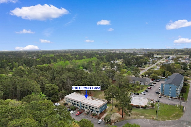 610 Putters Ln Unit H-109, Little River, SC 29566 - bird's eye view featuring a forest view
