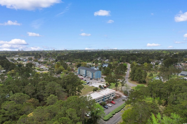 610 Putters Ln Unit H-109, Little River, SC 29566 - birds eye view of property with a wooded view