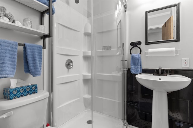 610 Putters Ln Unit H-109, Little River, SC 29566 - bathroom featuring a shower stall and toilet