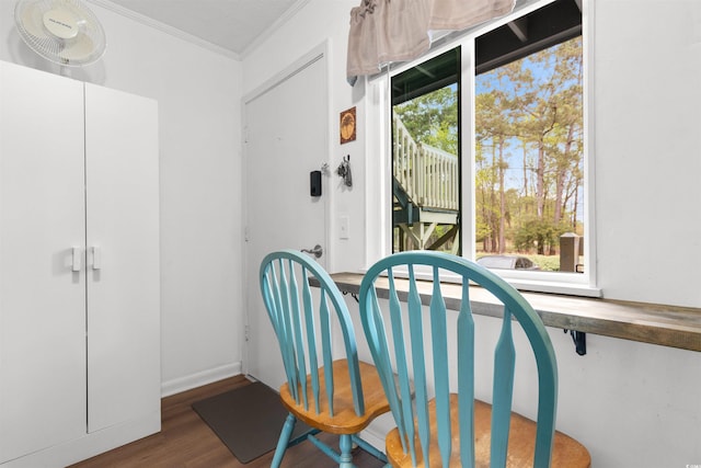 610 Putters Ln Unit H-109, Little River, SC 29566 - dining room featuring crown molding and wood finished floors