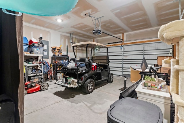 7037 Grant St, Little River, SC 29566 - garage featuring a garage door opener