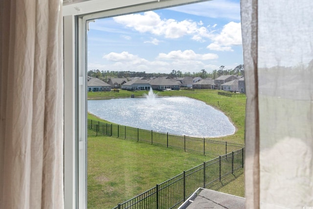 7037 Grant St, Little River, SC 29566 - water view with a fenced backyard and nearby suburban area