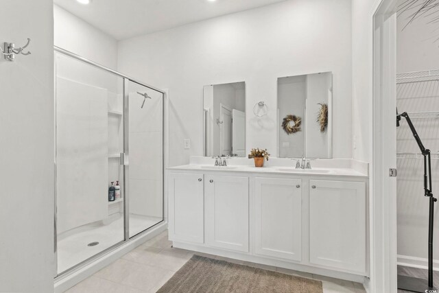 7037 Grant St, Little River, SC 29566 - full bathroom featuring a shower stall, double vanity, tile patterned floors, and recessed lighting