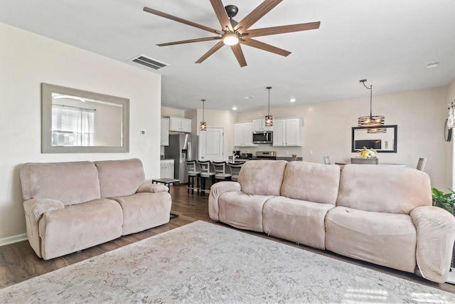 7037 Grant St, Little River, SC 29566 - living area featuring a ceiling fan, dark wood-style floors, baseboards, and recessed lighting