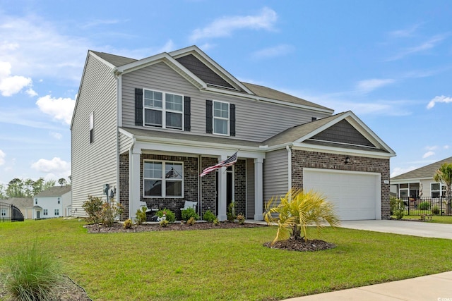 7037 Grant St, Little River, SC 29566 - craftsman-style house with driveway, an attached garage, and brick siding