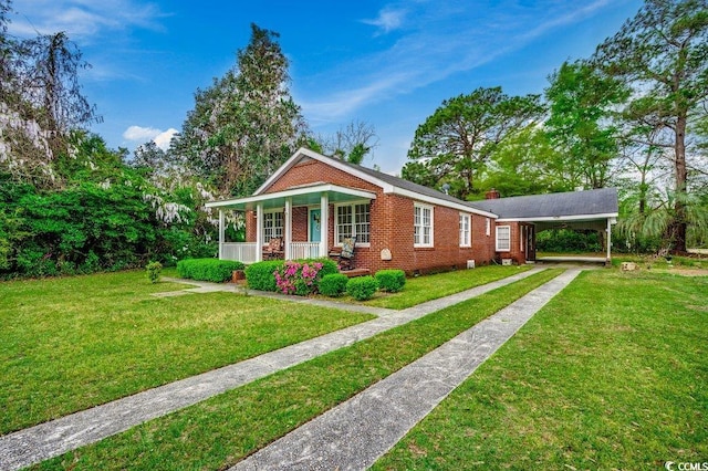 view of front of home featuring a porch, concrete driveway, brick siding, a front lawn, and an attached carport