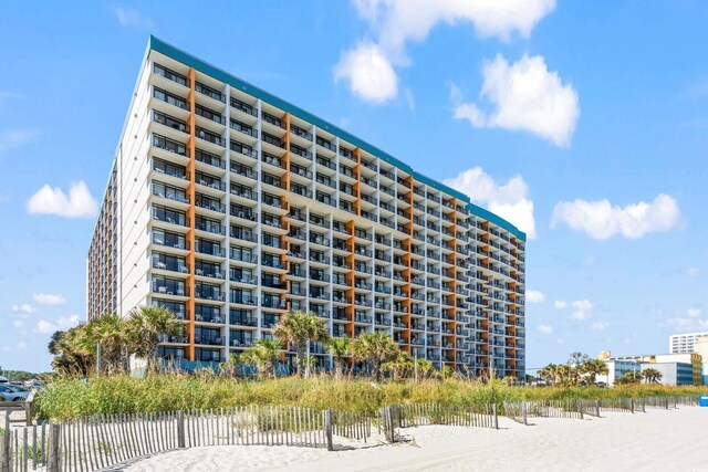 1501 S Ocean Blvd Unit 845, Myrtle Beach, SC 29577 - view of building exterior with fence