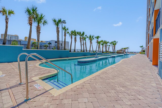 1501 S Ocean Blvd Unit 845, Myrtle Beach, SC 29577 - pool with a jacuzzi and a patio