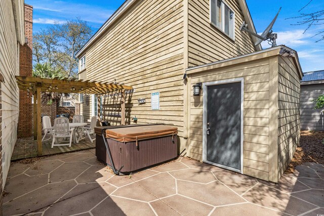 1521 Edge Dr, North Myrtle Beach, SC 29582 - view of patio with outdoor dining space, a pergola, and a hot tub