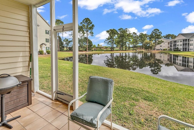 5090 Windsor Green Way Unit 103, Myrtle Beach, SC 29579 - sunroom / solarium featuring a water view