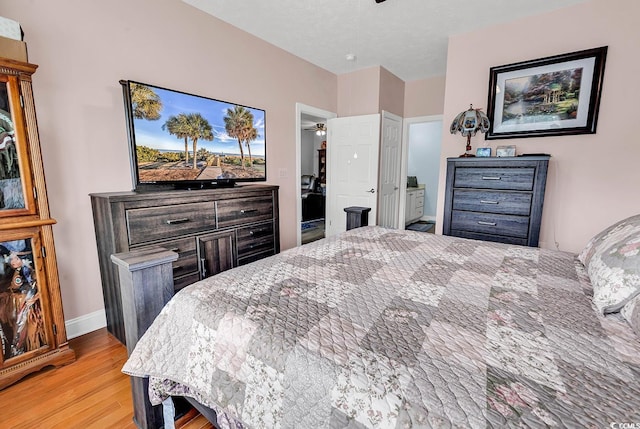 5090 Windsor Green Way Unit 103, Myrtle Beach, SC 29579 - bedroom with light wood finished floors and baseboards