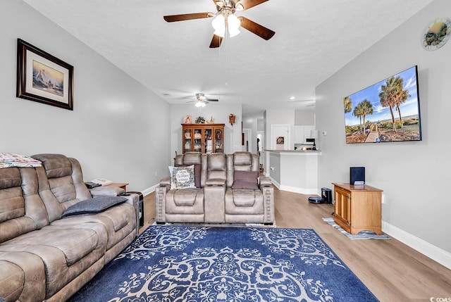 5090 Windsor Green Way Unit 103, Myrtle Beach, SC 29579 - living area featuring a ceiling fan and light wood-style flooring