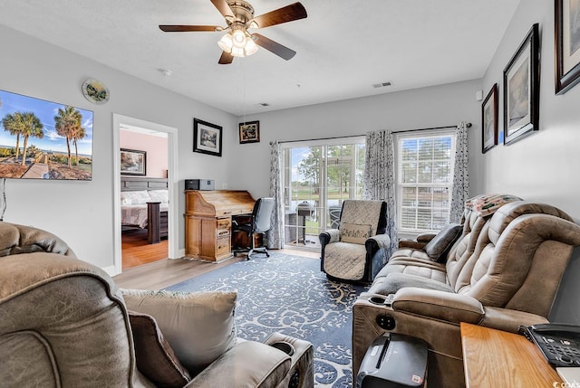 5090 Windsor Green Way Unit 103, Myrtle Beach, SC 29579 - living room with wood finished floors, ceiling fan, and an office area