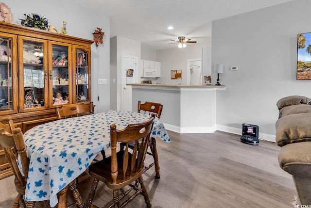 5090 Windsor Green Way Unit 103, Myrtle Beach, SC 29579 - dining space with wood finished floors, ceiling fan, and recessed lighting