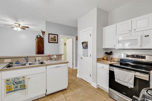 5090 Windsor Green Way Unit 103, Myrtle Beach, SC 29579 - kitchen with white appliances, light tile patterned flooring, a ceiling fan, and light countertops