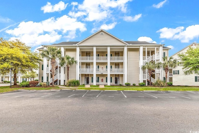 5090 Windsor Green Way Unit 103, Myrtle Beach, SC 29579 - view of property featuring uncovered parking