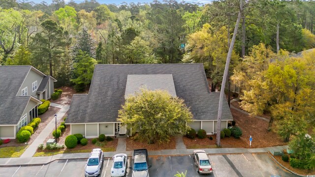 1545 Spinnaker Dr Unit 2C, North Myrtle Beach, SC 29582 - aerial view of property and surrounding area featuring a forest