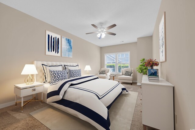 1545 Spinnaker Dr Unit 2C, North Myrtle Beach, SC 29582 - bedroom featuring light colored carpet, baseboards, and ceiling fan