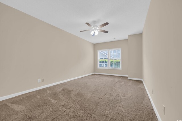 1545 Spinnaker Dr Unit 2C, North Myrtle Beach, SC 29582 - empty room featuring ceiling fan, carpet flooring, and baseboards