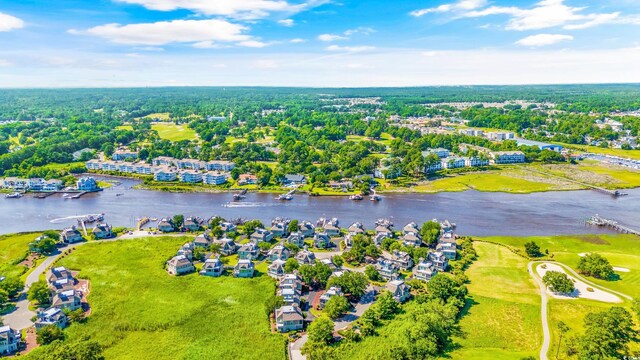 1545 Spinnaker Dr Unit 2C, North Myrtle Beach, SC 29582 - drone / aerial view of a large body of water and a local golf course