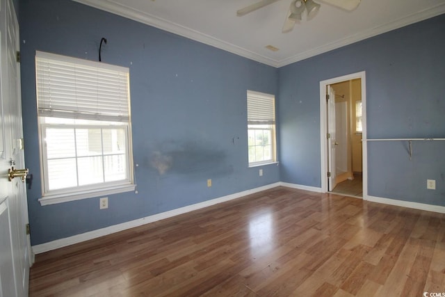331 S Willow Dr, Surfside Beach, SC 29575 - unfurnished bedroom with wood finished floors, ceiling fan, baseboards, and ornamental molding