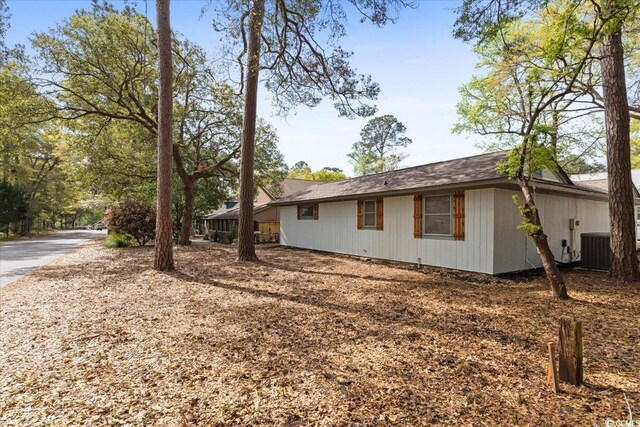 2108 Brunswick Cir, Little River, SC 29566 - view of side of home featuring a central air condition unit
