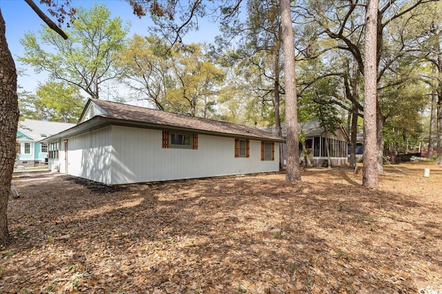 2108 Brunswick Cir, Little River, SC 29566 - view of property exterior with a sunroom
