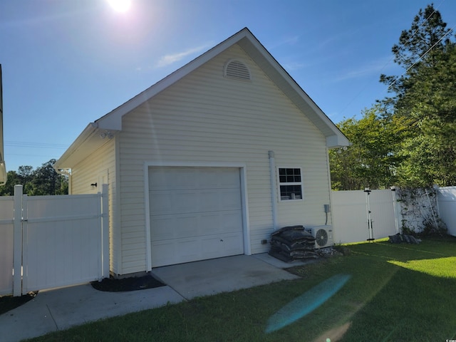 7473 Louisville Rd, Aynor, SC 29511 - detached garage with fence, a gate, and ac unit