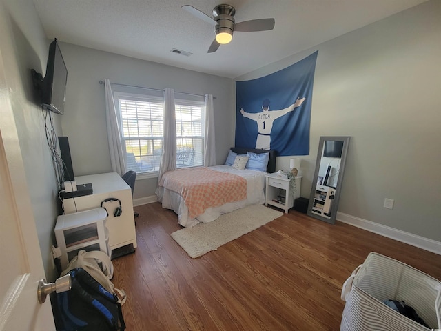 7473 Louisville Rd, Aynor, SC 29511 - bedroom featuring ceiling fan, baseboards, visible vents, and wood finished floors