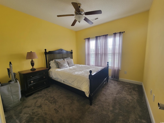7473 Louisville Rd, Aynor, SC 29511 - bedroom featuring visible vents, baseboards, ceiling fan, a textured ceiling, and carpet flooring