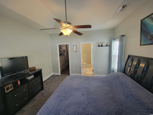 7473 Louisville Rd, Aynor, SC 29511 - bedroom featuring visible vents, baseboards, dark carpet, ceiling fan, and a walk in closet