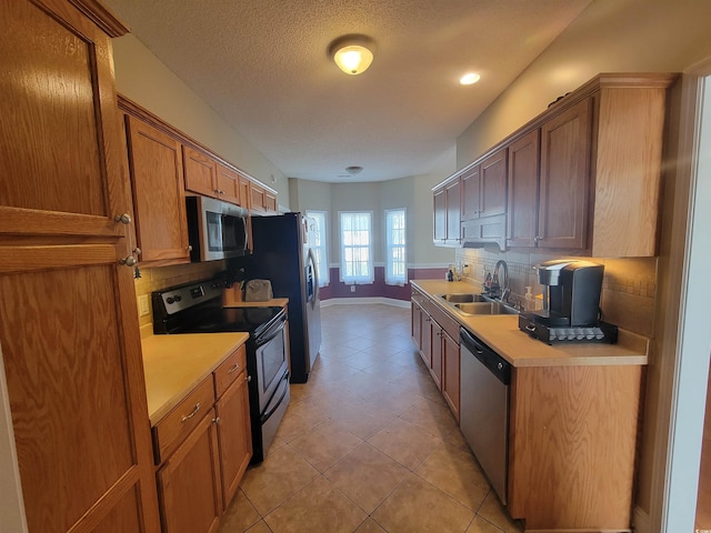 7473 Louisville Rd, Aynor, SC 29511 - kitchen with a sink, light countertops, tasteful backsplash, and appliances with stainless steel finishes