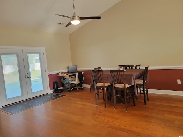 7473 Louisville Rd, Aynor, SC 29511 - dining space with a ceiling fan, vaulted ceiling, visible vents, wood finished floors, and french doors