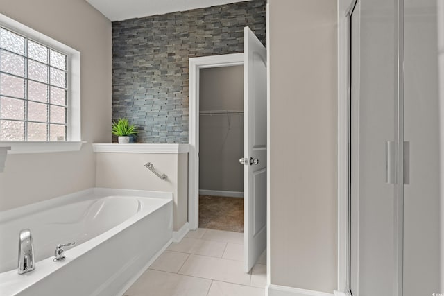 826 Sand Binder Dr, Myrtle Beach, SC 29579 - full bath featuring a garden tub, tile patterned flooring, a shower stall, and a walk in closet