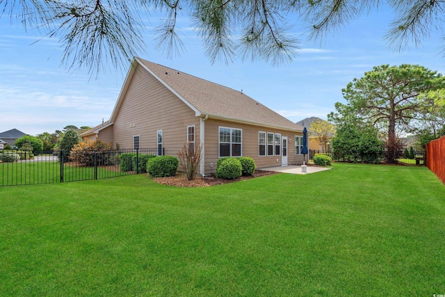 826 Sand Binder Dr, Myrtle Beach, SC 29579 - rear view of property featuring a patio area and a fenced backyard