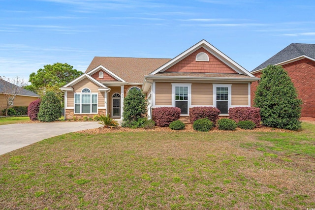 826 Sand Binder Dr, Myrtle Beach, SC 29579 - view of front facade with a front lawn and stone siding